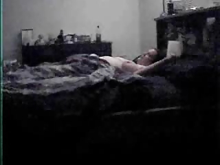 My divorced mum masturbates on bed. Hidden cam